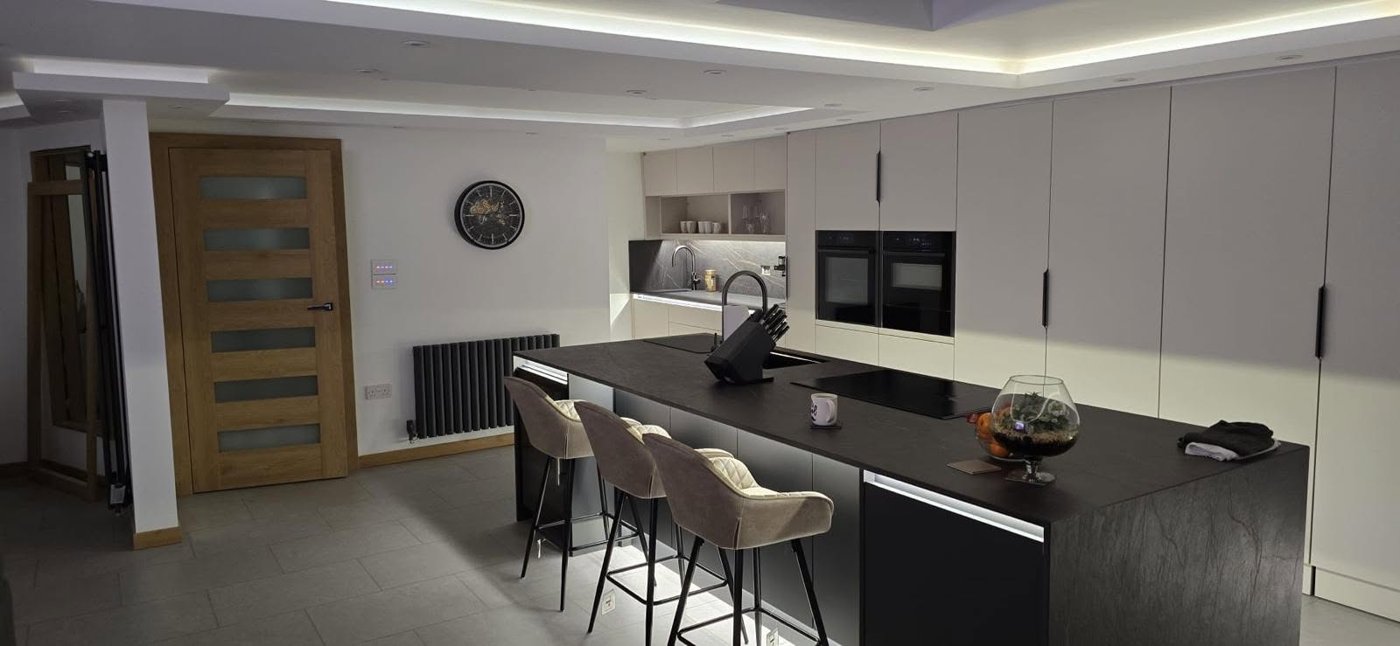 Open-plan kitchen with bi-fold doors